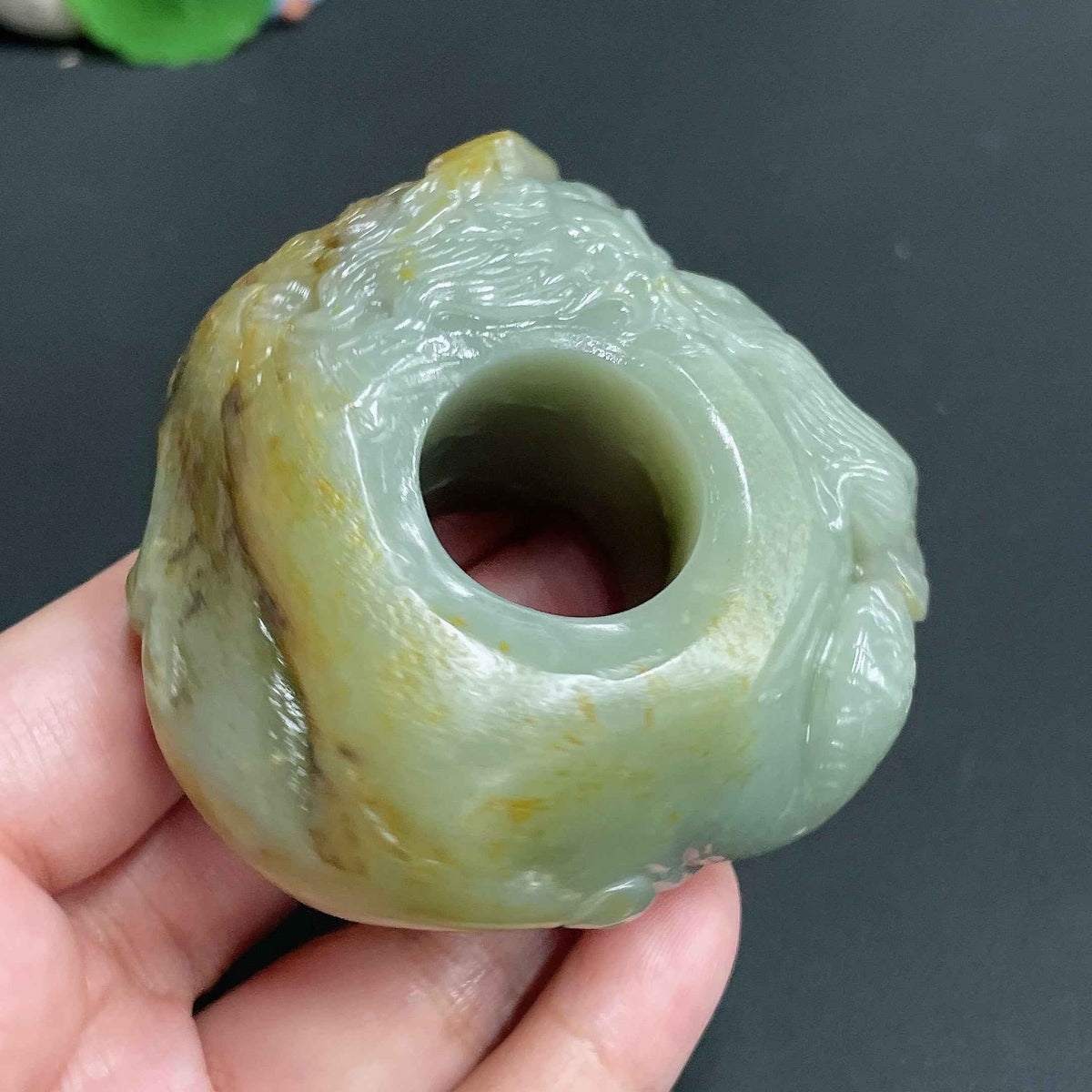 Huiliu Hetian Jade Seed Material Thumb Ring with roaming dragon design, 22.4mm, undetermined skin color, certified jade jewelry.