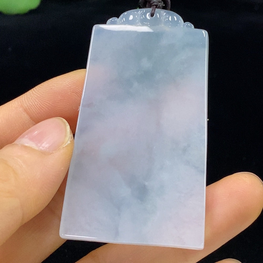 Antique jadeite pendant from HUILIU HQ featuring intricate traditional design and rich green color.