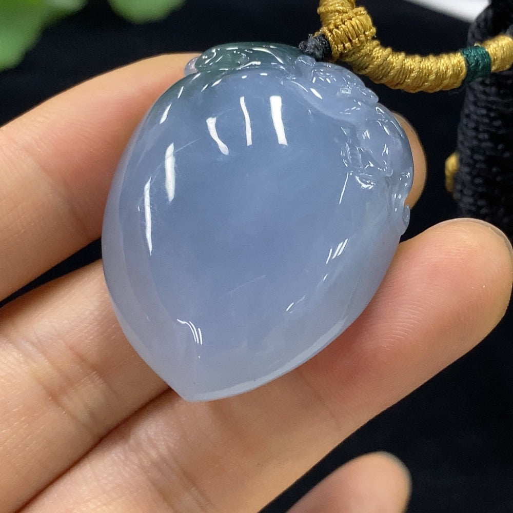 Jadeite "Auspicious Monkey Offering Longevity" pendant from HUILIU HQ, featuring carved jade with intricate monkey design.
