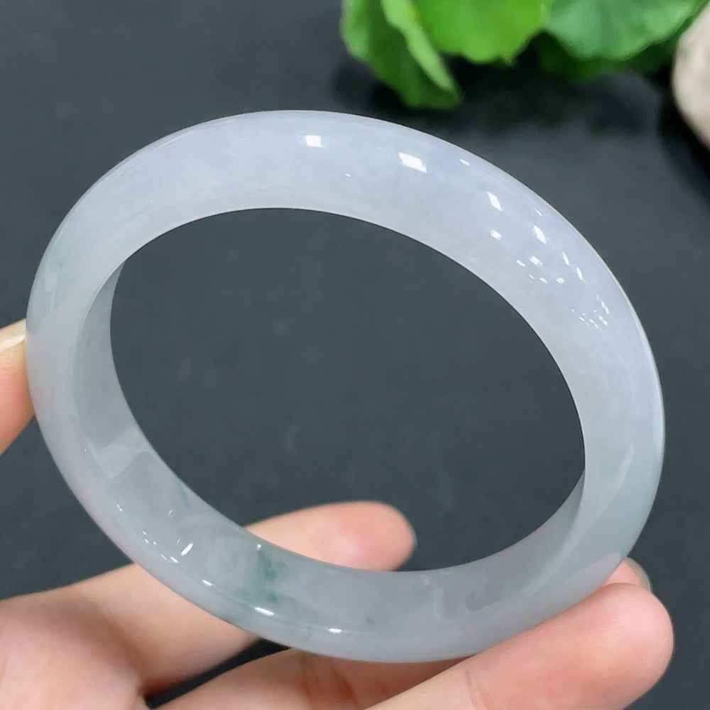 HUILIU HQ jadeite bangle, size 58.8mm, weighs 56.4g, featuring smooth, polished green jade with natural variations.