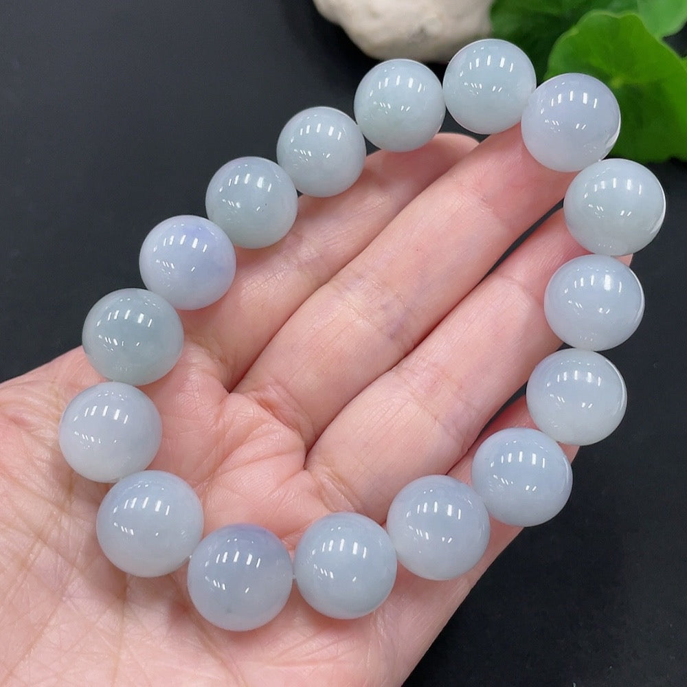 HUILIU HQ jadeite beaded necklace with 13.5mm beads, approx. 70g, showcasing smooth green jade beads on a necklace.