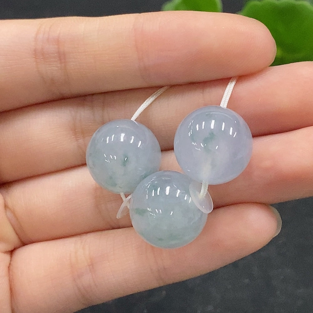 Huiliu HQ jadeite beads lot, natural green jade jewelry beads, Huiliu certified jade gemstone strands in close-up image.