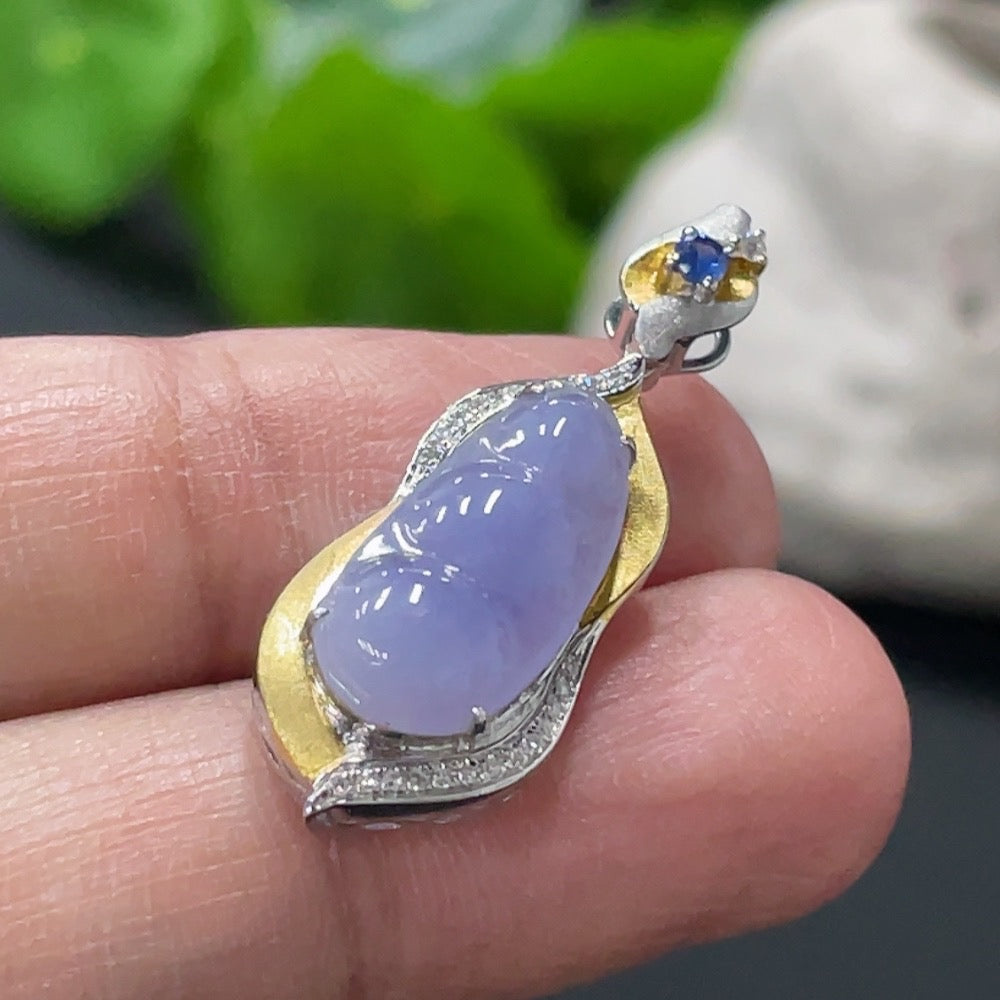 Jadeite blessing bean pendant by HUILIU HQ with 18K gold setting and diamond accents, showcasing intricate craftsmanship.