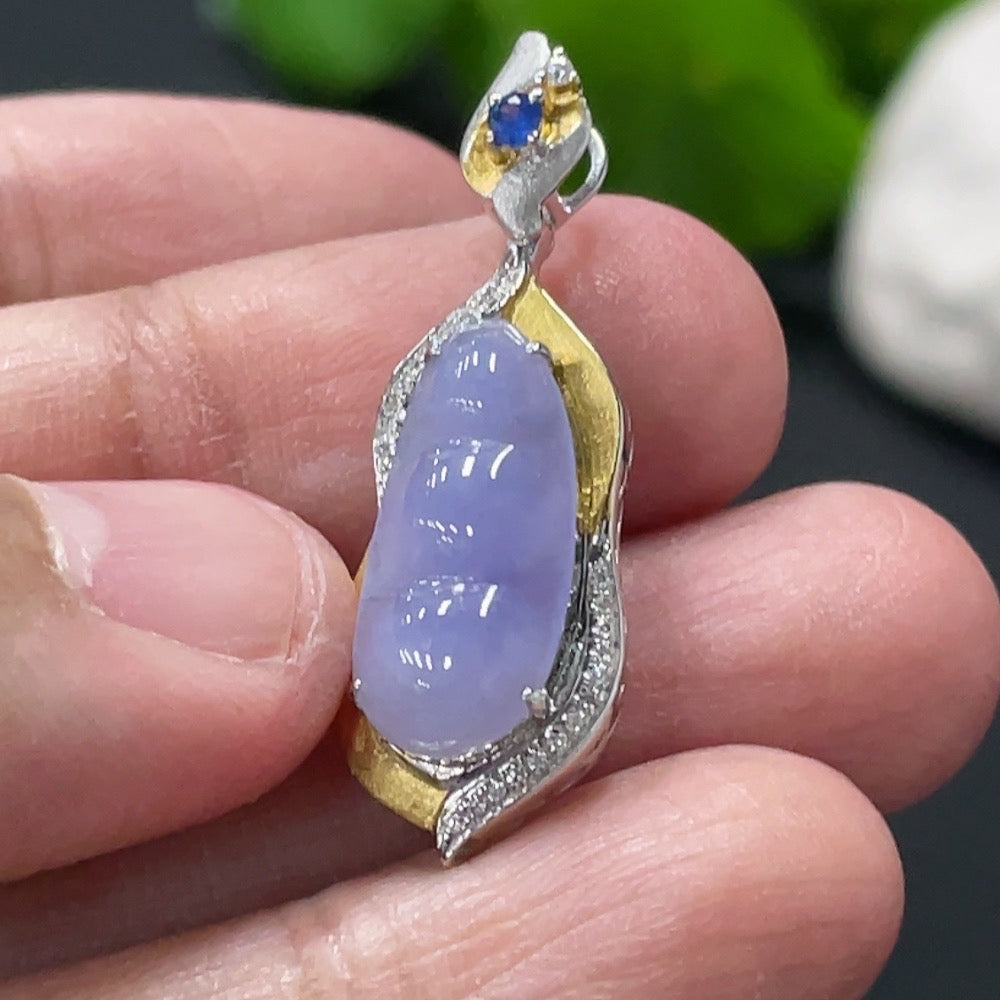 Jadeite blessing bean pendant with 18K gold setting, diamond accents, from HUILIU HQ, showcasing intricate craftsmanship and elegant design.