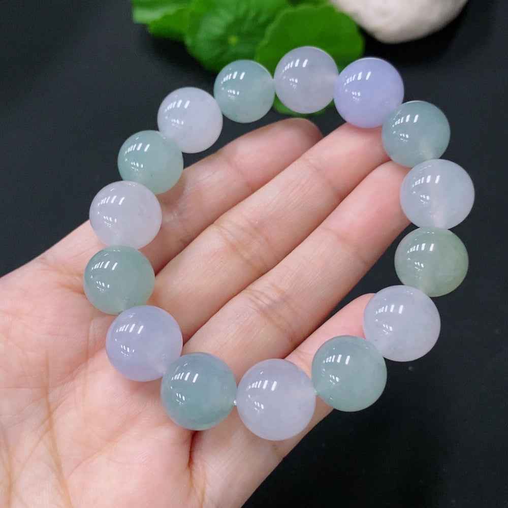 HUILIU HQ jadeite bracelet with 12.4-12.8mm beads, totaling approximately 54.7g, showcasing smooth, polished jade jewelry.