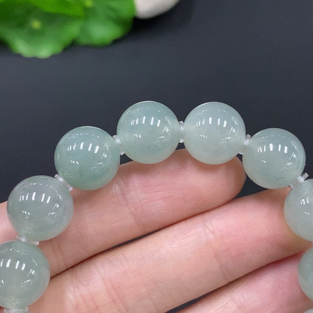HUILIU HQ jadeite bracelet with 12.5mm beads, smooth polished surface, and a total weight of approximately 51.2g.