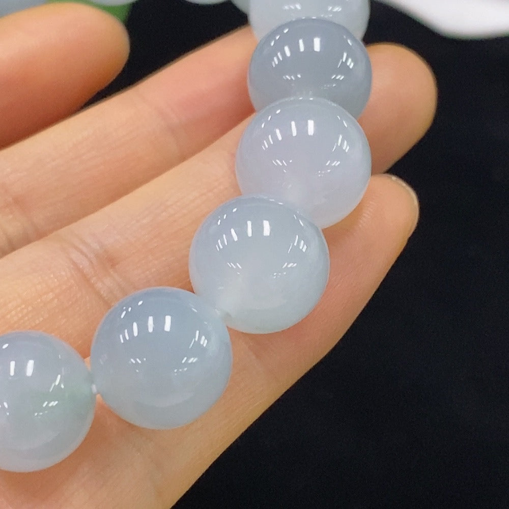 HUILIU HQ jadeite bracelet, 12.1mm size, approx. 51.08g, showcasing smooth green jade beads on a string.
