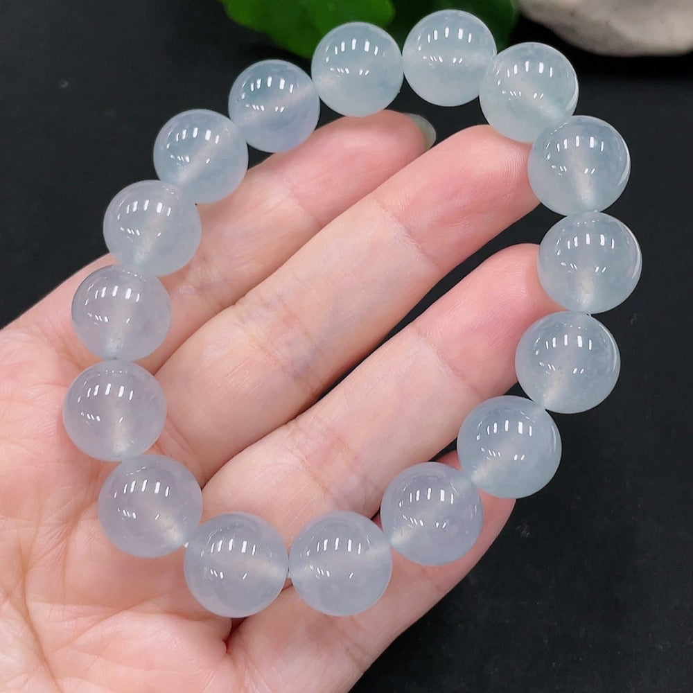 HUILIU HQ jadeite bracelet, 12.6mm wide, with smooth polished surface and a total weight of 57.2g, showcasing vibrant green jade.