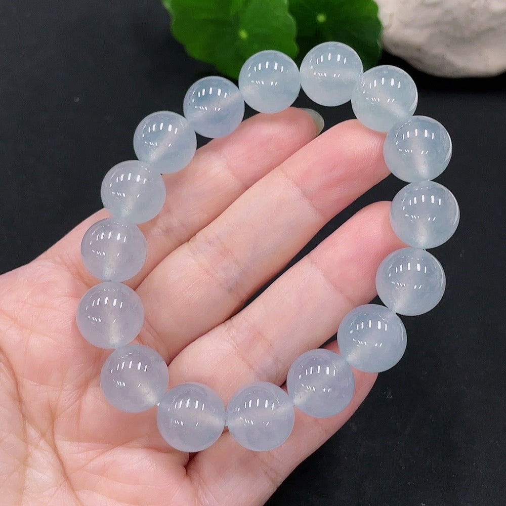 HUILIU HQ jadeite bracelet with 12.6mm size, 57.2g weight, featuring smooth, polished jade stones on a flexible band.