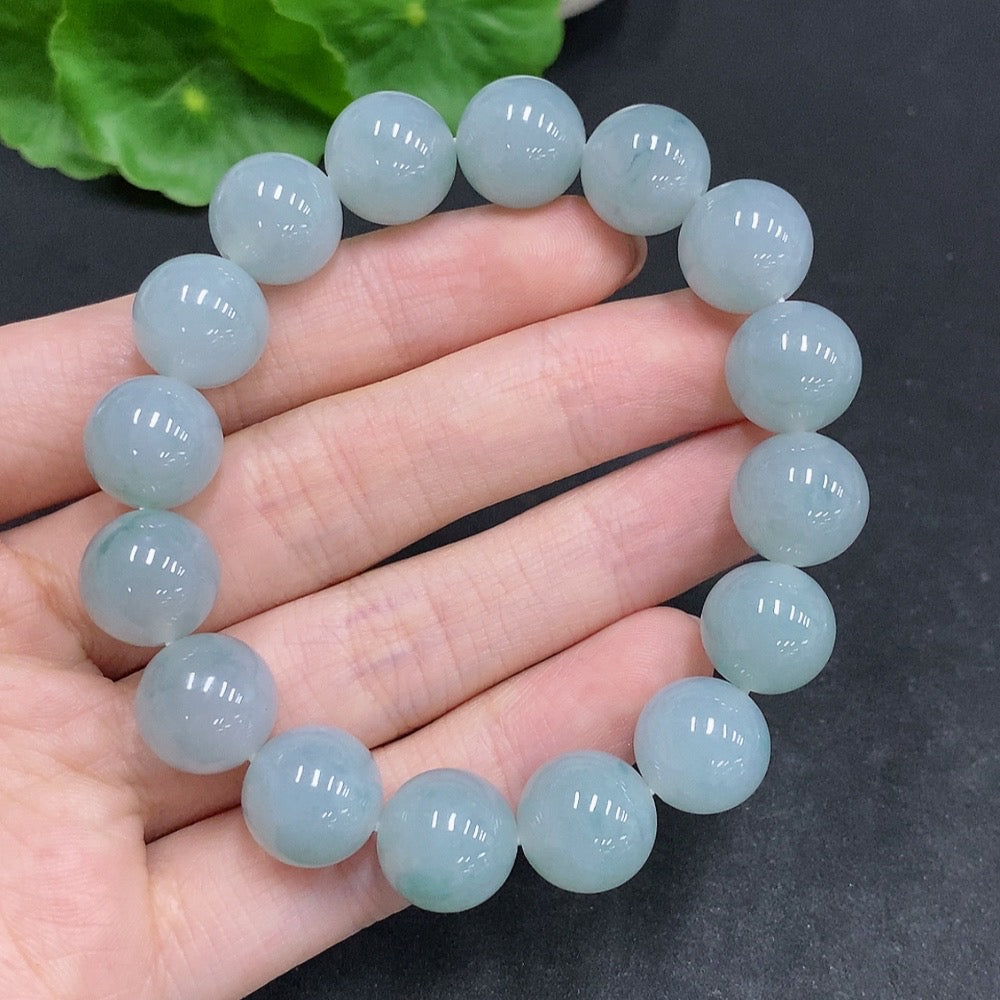 HUILIU HQ Jadeite bracelet with approximately 52.1g weight and 12.3mm size, featuring smooth, polished green jade beads.