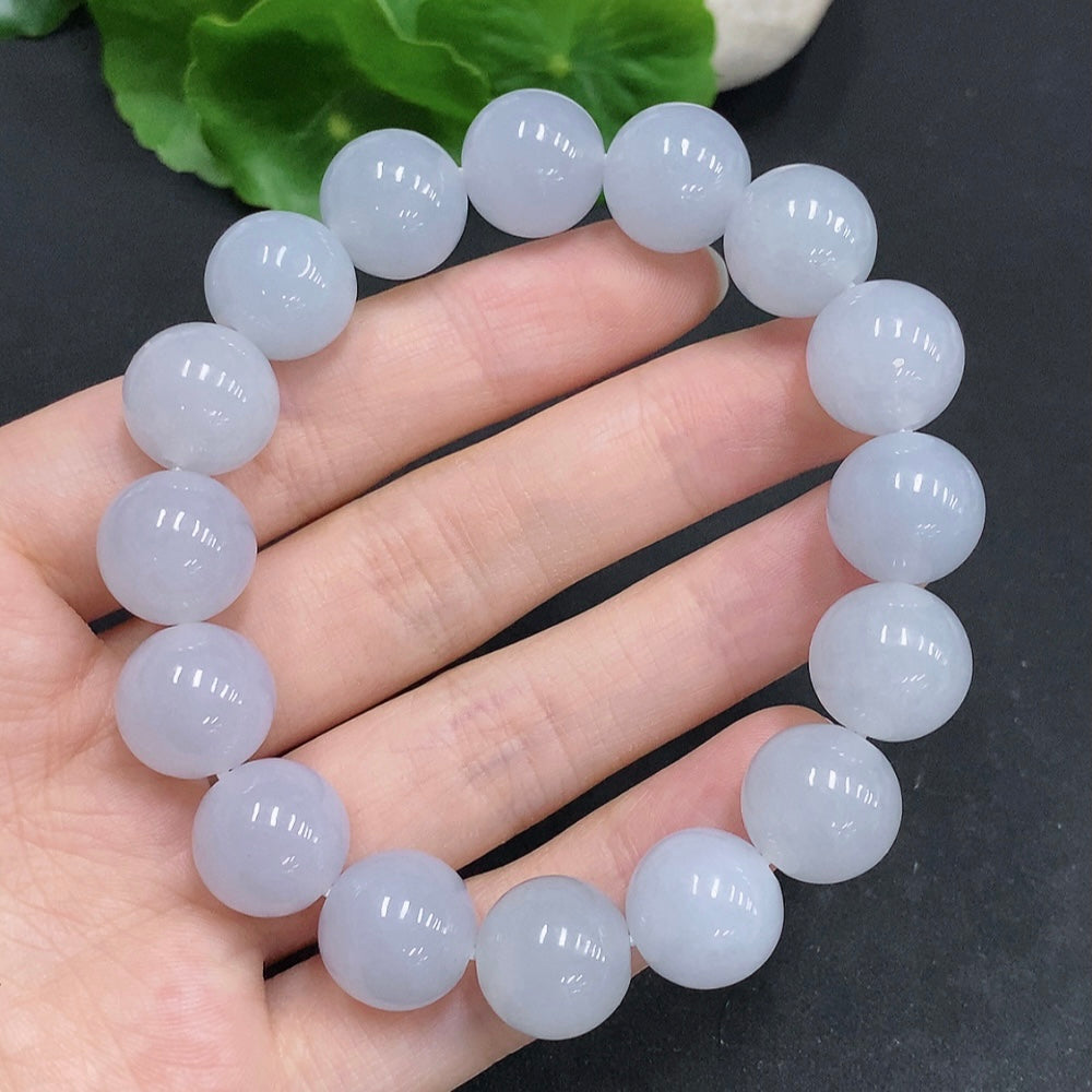 HUILIU HQ jadeite bracelet weighing 67.4g with 13.3mm size, showcasing smooth, polished green jade beads.