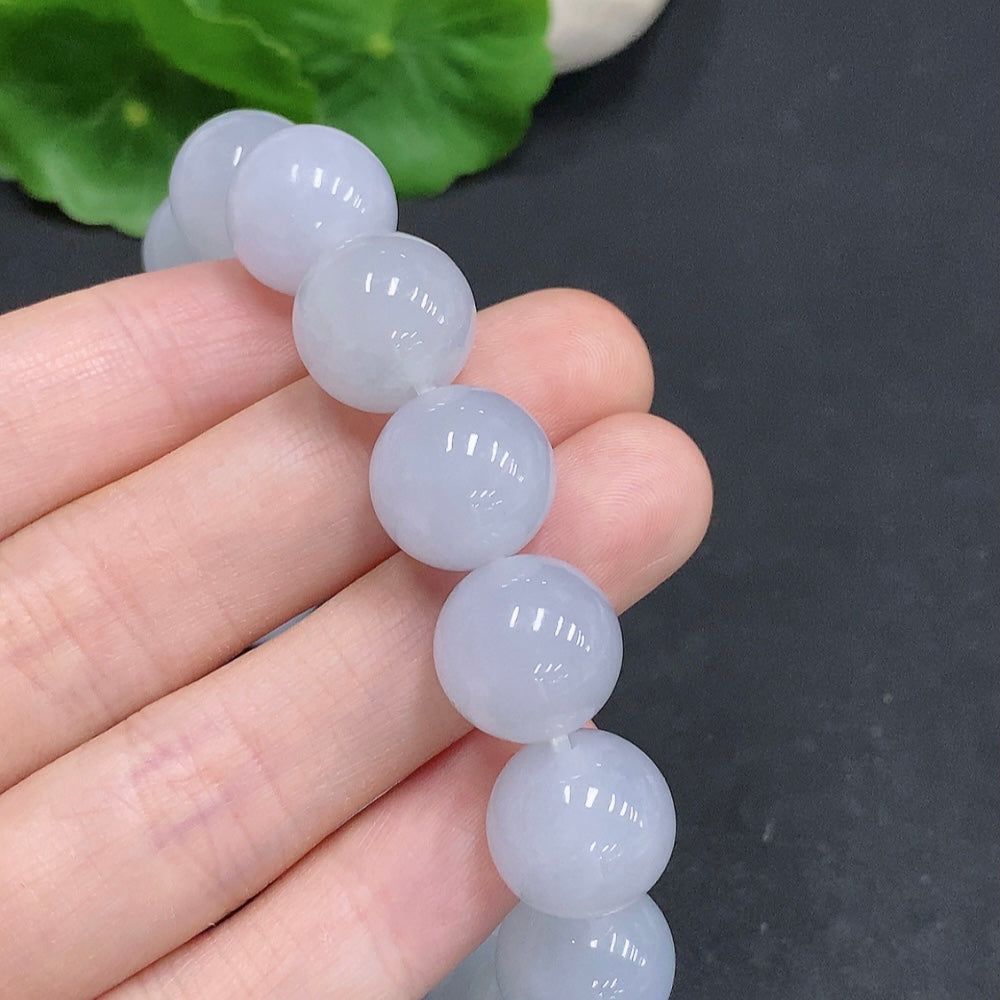 HUILIU HQ jadeite bracelet weighing 67.4g with 13.3mm size, featuring smooth, polished jade stones in a stylish jewelry design.