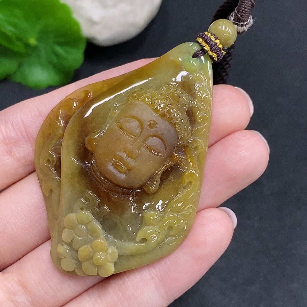 HUILIU HQ Jadeite Buddha flower pendant featuring a detailed carved jade Buddha design on a smooth jade surface.