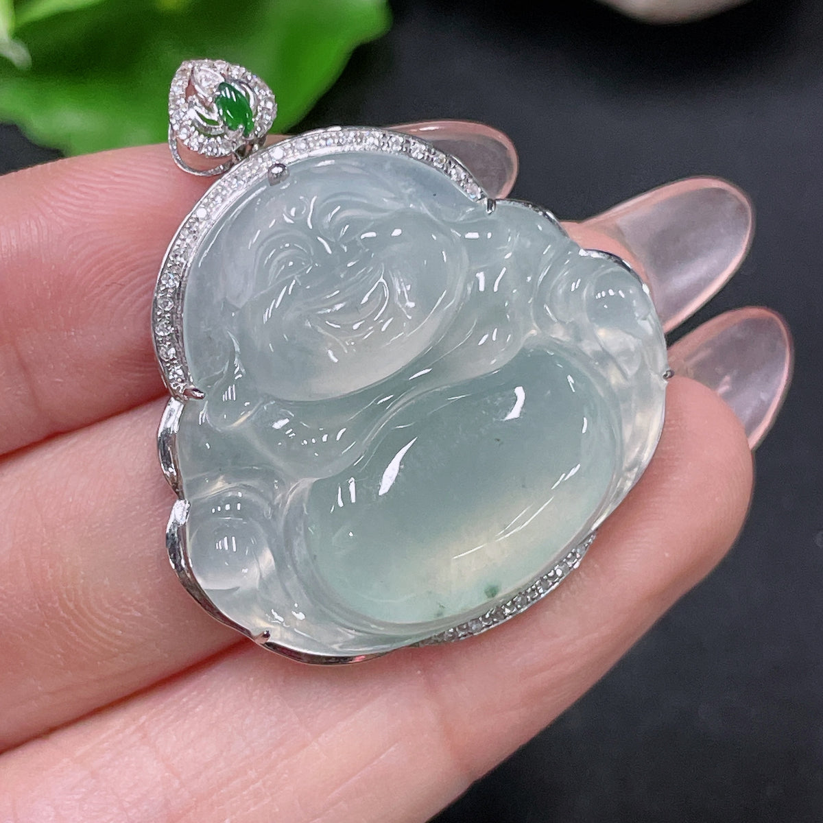 Jadeite Buddha inlay piece by HUILIU HQ featuring 18k gold and diamond accents, weighs approximately 8.48g.