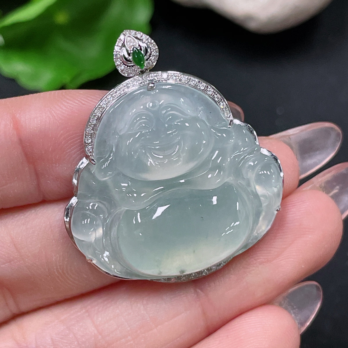 Jadeite Buddha inlay piece by HUILIU HQ with 18k gold and diamond accents, weighing approximately 8.48 grams.