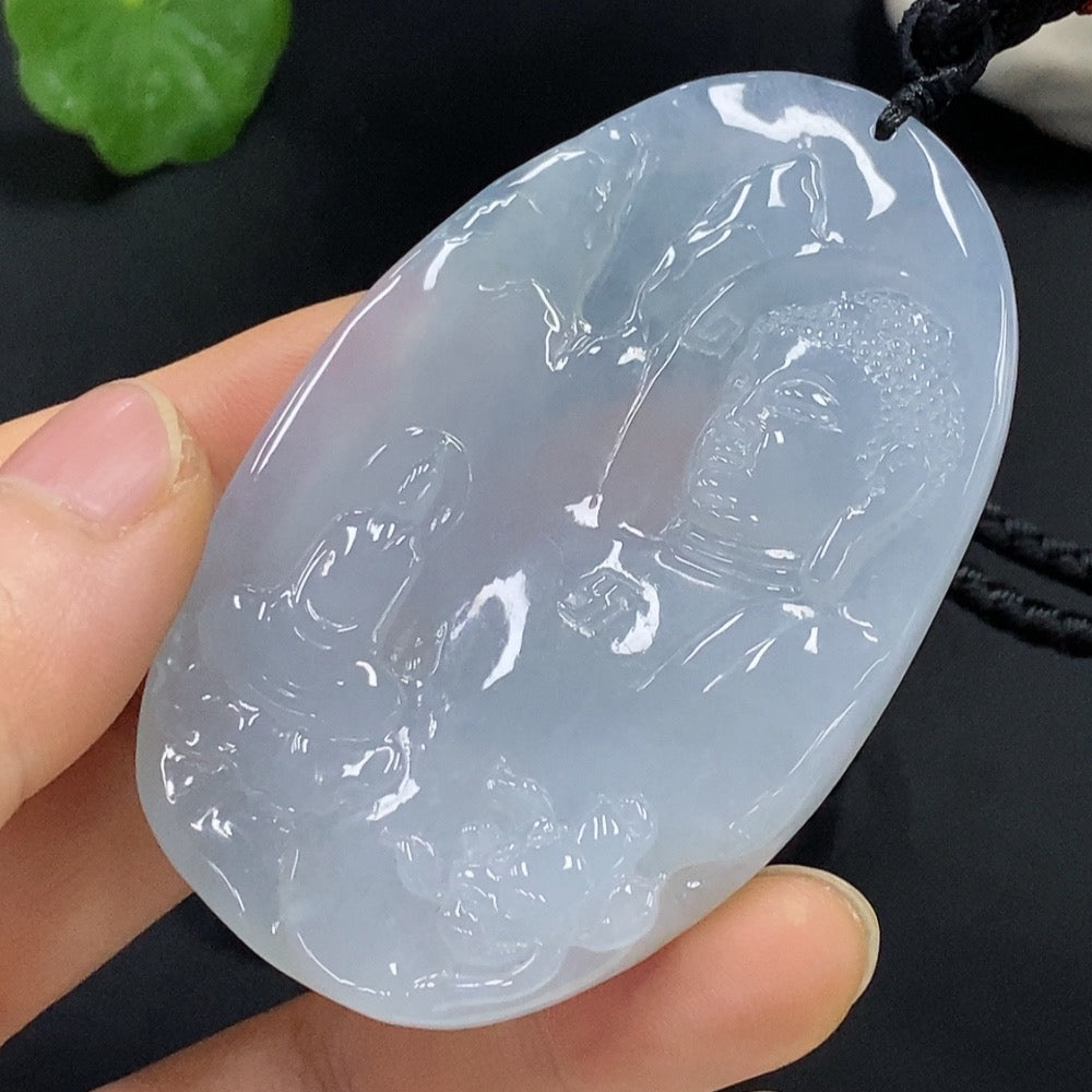 Jadeite Buddha pendant by HUILIU HQ featuring a Buddha observing the world, crafted in smooth green jade with detailed carving.
