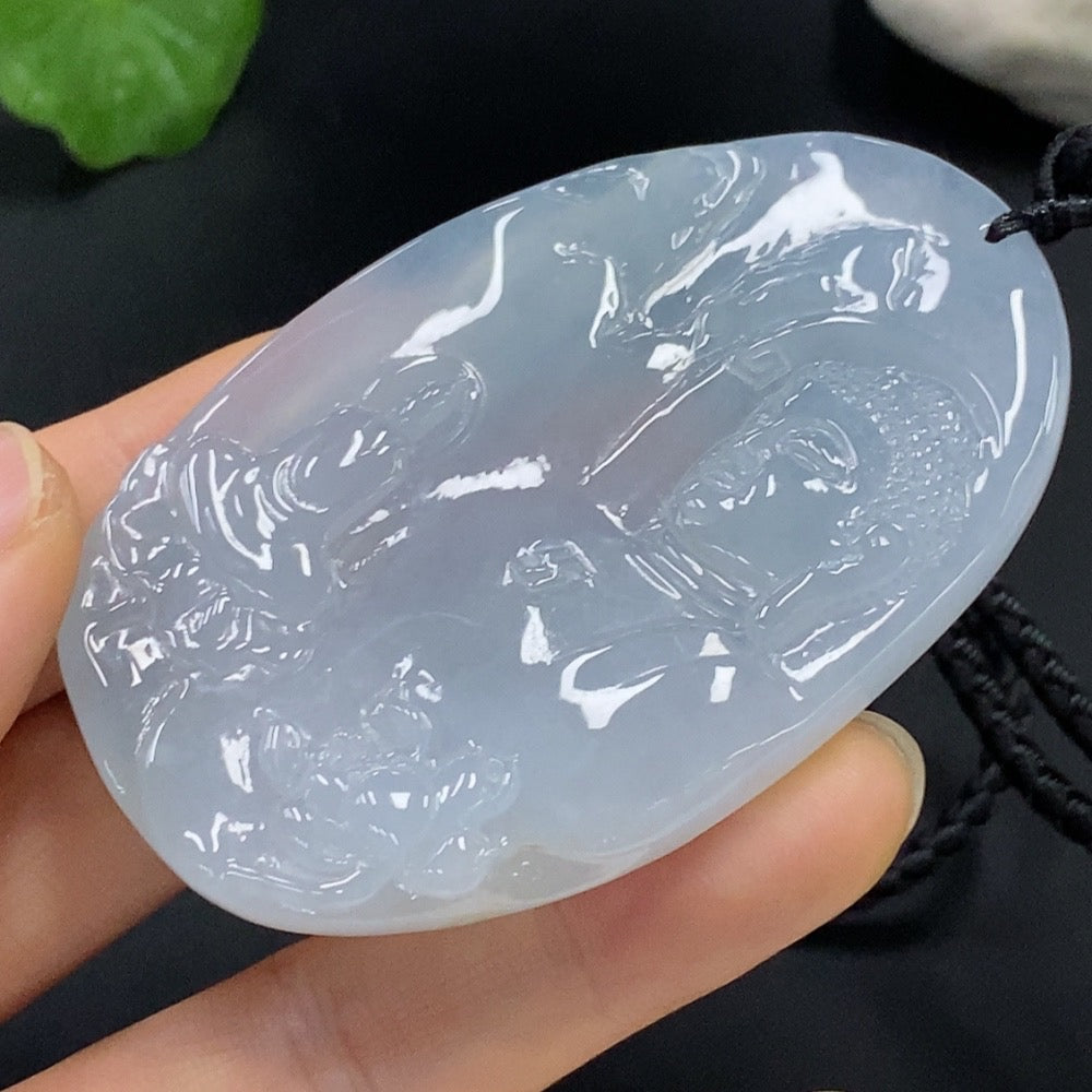 Jadeite Buddha pendant by HUILIU HQ featuring a Buddha observing the world, crafted from smooth green jade.