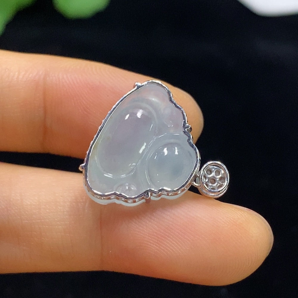 Huiliu HQ jadeite Buddha pendant set with diamond accents, featuring a detailed jade Buddha figure on a necklace.