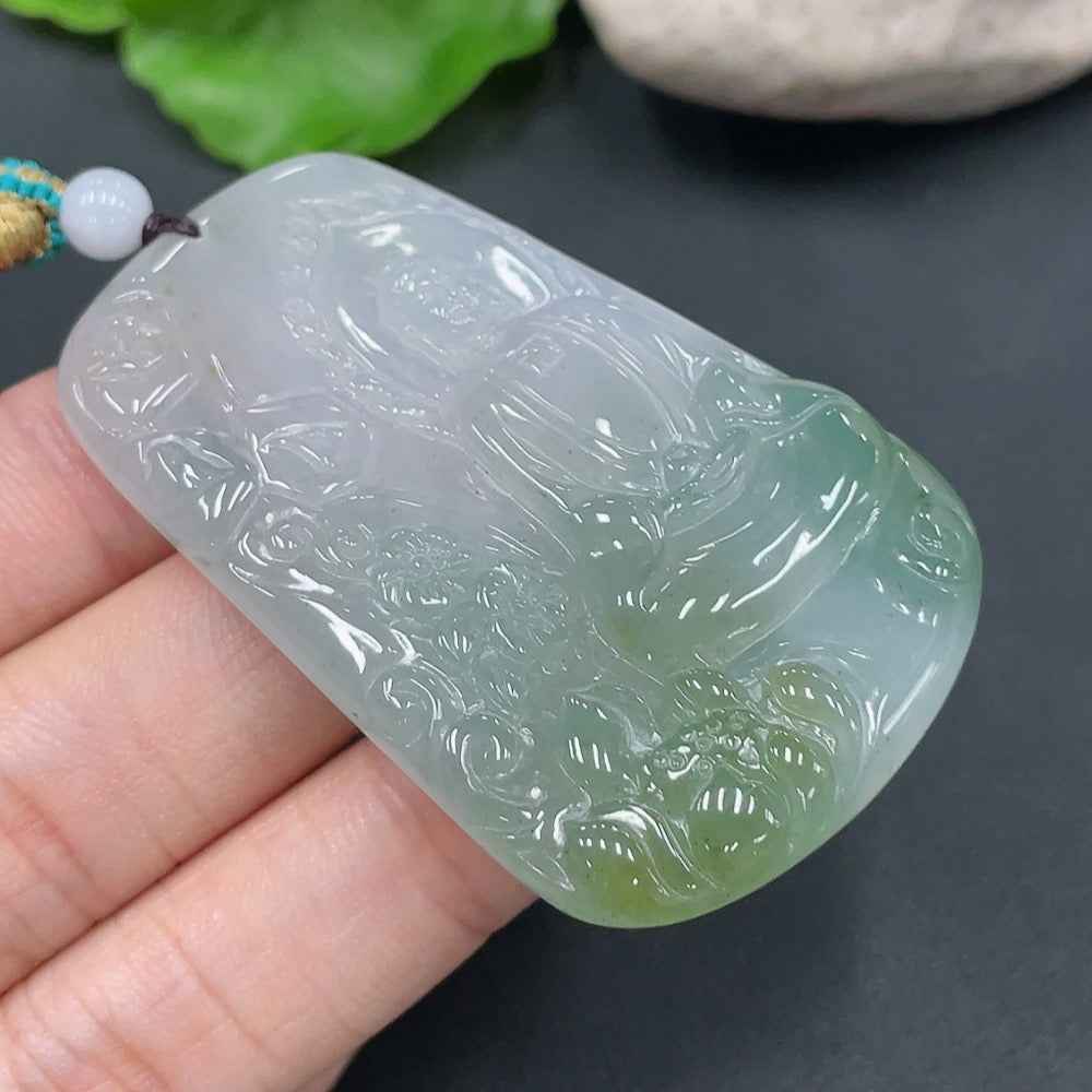 Jadeite Buddha pendant weighing 28.657g with detailed carved Buddha figure, crafted by HUILIU HQ in smooth green jade.