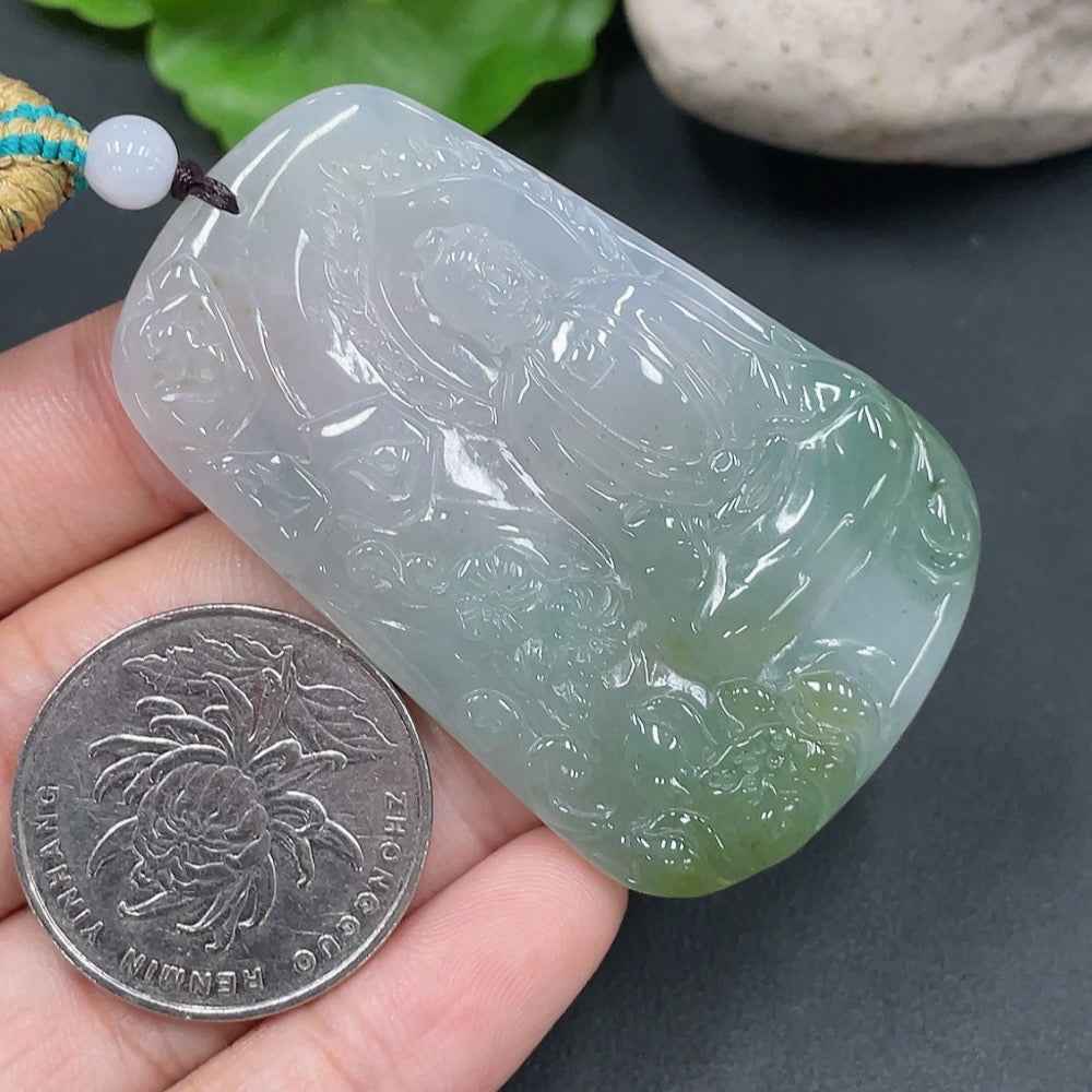 HUILIU HQ jadeite Buddha pendant weighing 28.657g, featuring a detailed carved Buddha figure on smooth jade surface.