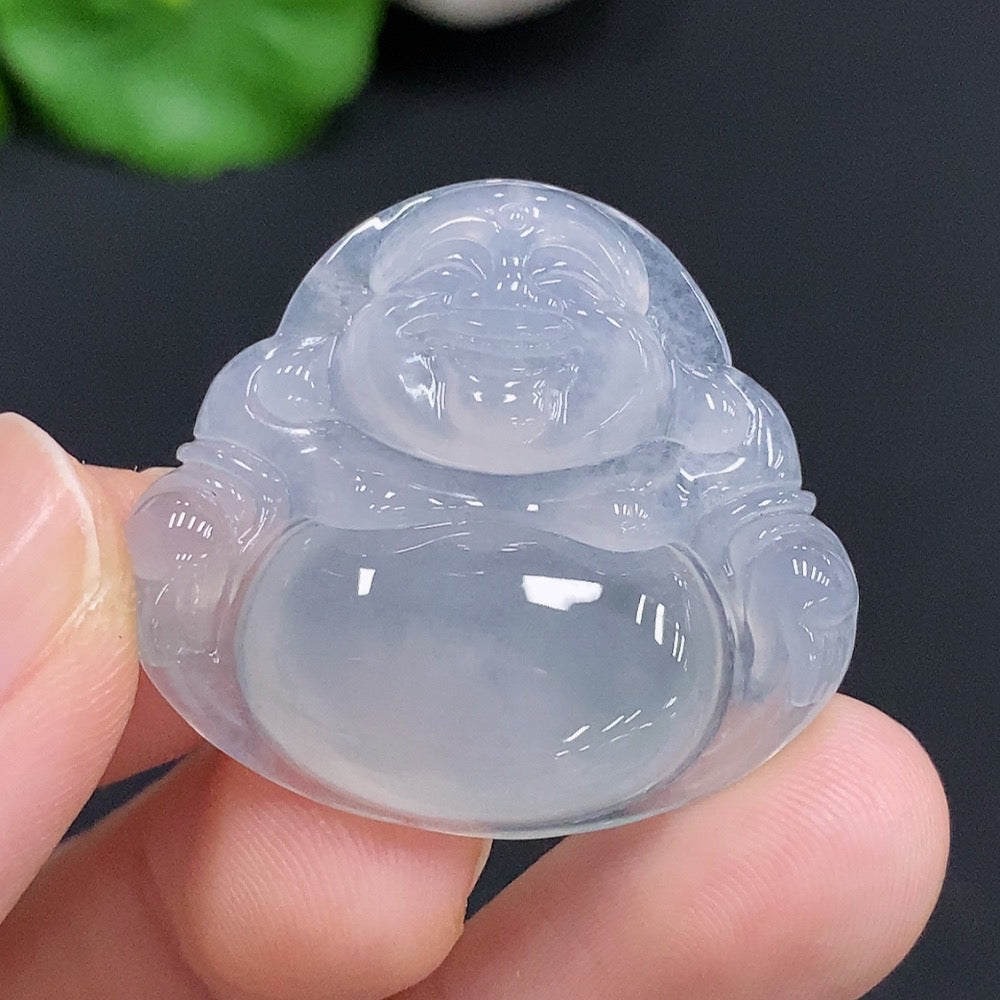 Jadeite Buddha pendant from HUILIU HQ, approx. 7.3g, featuring intricate Buddha design on smooth green jade stone.