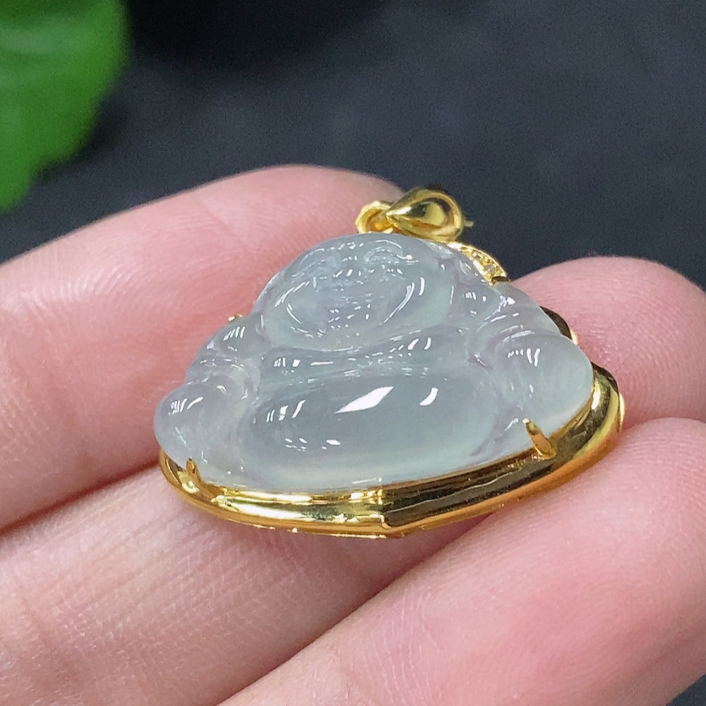 Jadeite Buddha pendant with 18K gold and diamond accents, showcasing intricate design and shiny polished surface.