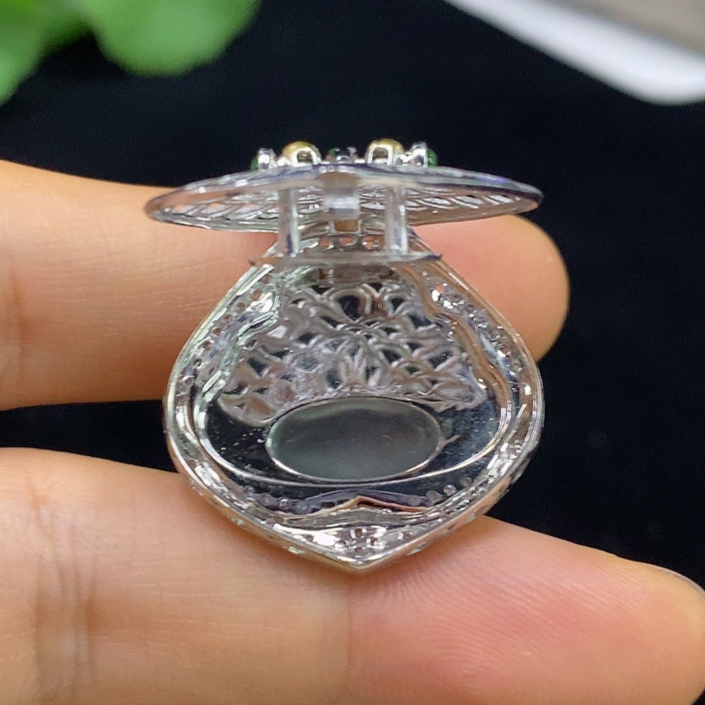 Huiliu HQ jadeite Buddha pendant with diamond accents, showcasing intricate carving and polished jade surface, approximately size.