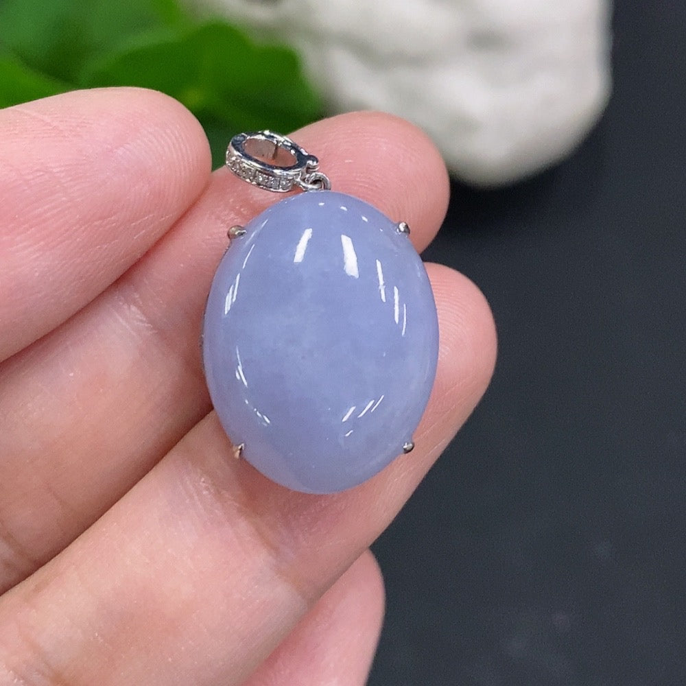 HUILIU HQ jadeite cabochon pendant with 18k gold setting and diamond accents, showcasing a polished green jade gemstone.