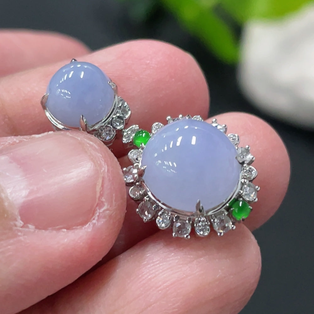 Jadeite cabochon pendant with 18K gold bezel and diamond accents, showcasing a polished green jade stone on a delicate chain.