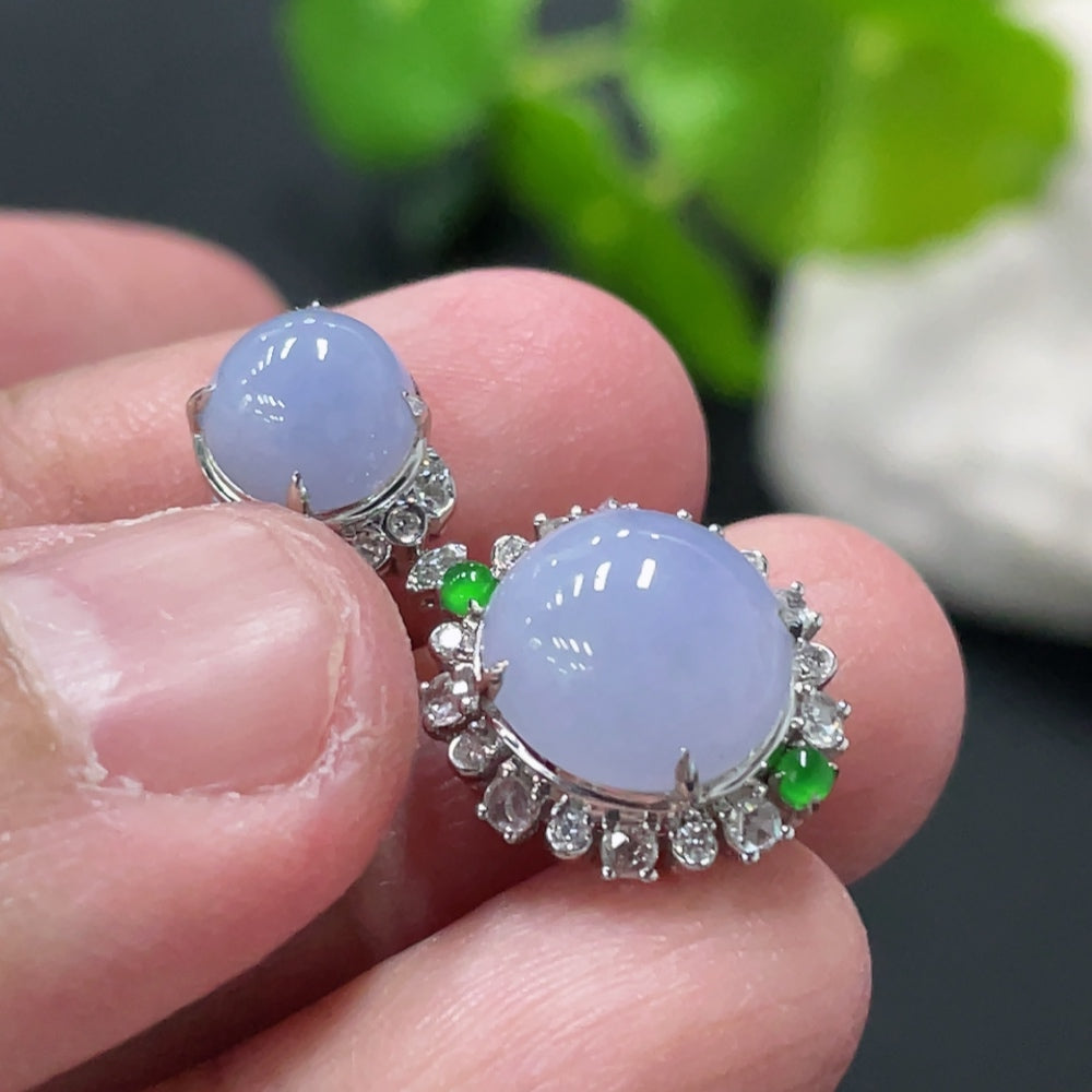 Jadeite cabochon pendant with 18K gold and diamond accents, showcasing a smooth green jade stone on a delicate gold chain.