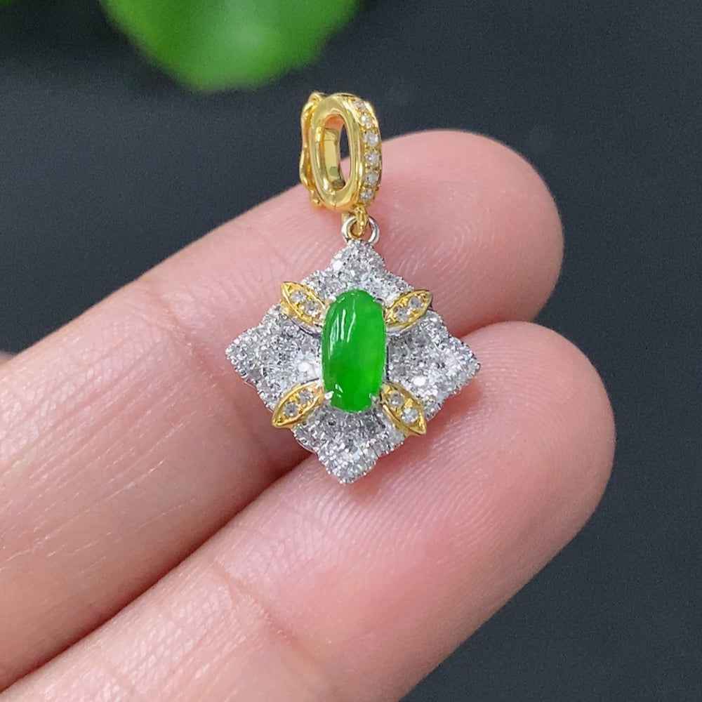 Jadeite cabochon pendant with 18K gold setting, featuring a smooth green jade stone on a delicate gold chain.