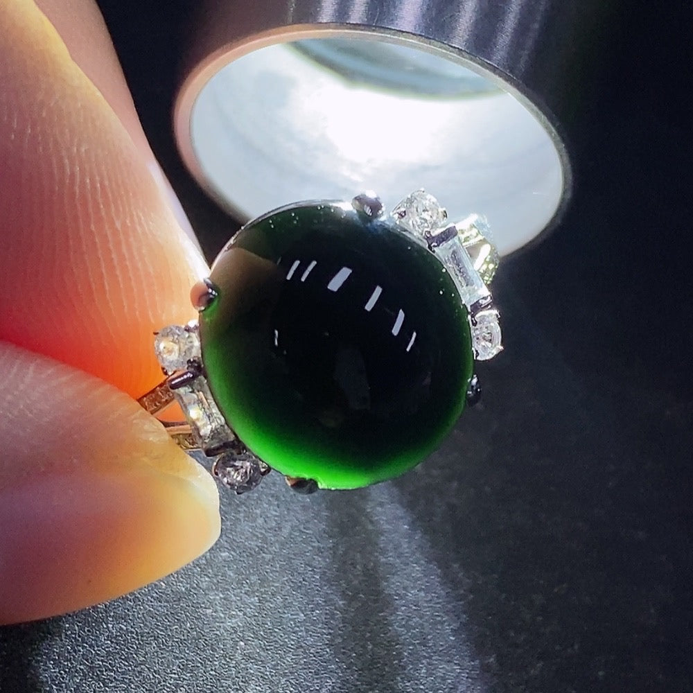 HUILIU HQ jadeite cabochon ring with 18K gold, size 18, accented with minimal diamond side stones, weighing approx. 3.71g.
