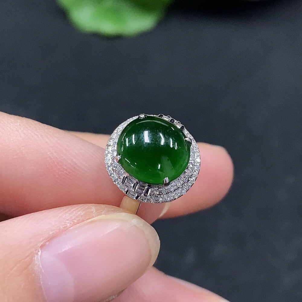 Huiliu Certified Jadeite Cabochon Ring with diamond accents, elegant jewelry featuring a smooth green jade stone and sparkling diamond details.