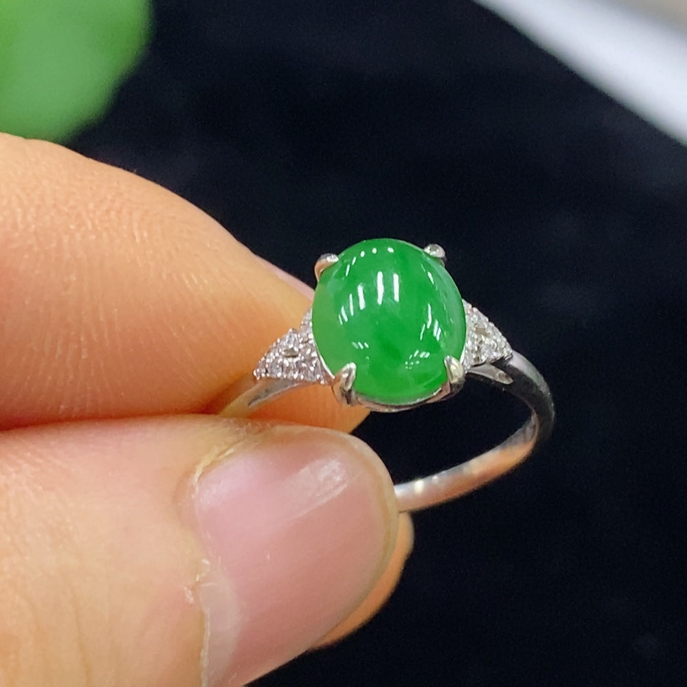 Jadeite cabochon ring in 18K gold with diamond accents, size 14, by HUILIU HQ, featuring a smooth green jade stone.