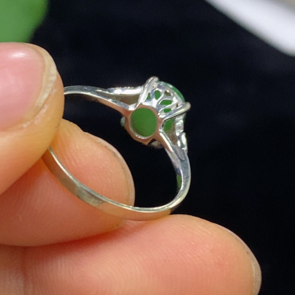 HUILIU HQ jadeite cabochon ring in 18K gold with diamond accents, size 14, featuring a polished green jade stone and elegant design.
