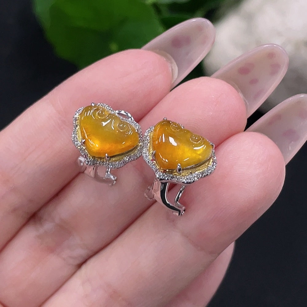 HUILIU HQ jadeite earrings pair with 18K gold and diamond accents, showcasing elegant green jade stones and gold settings.