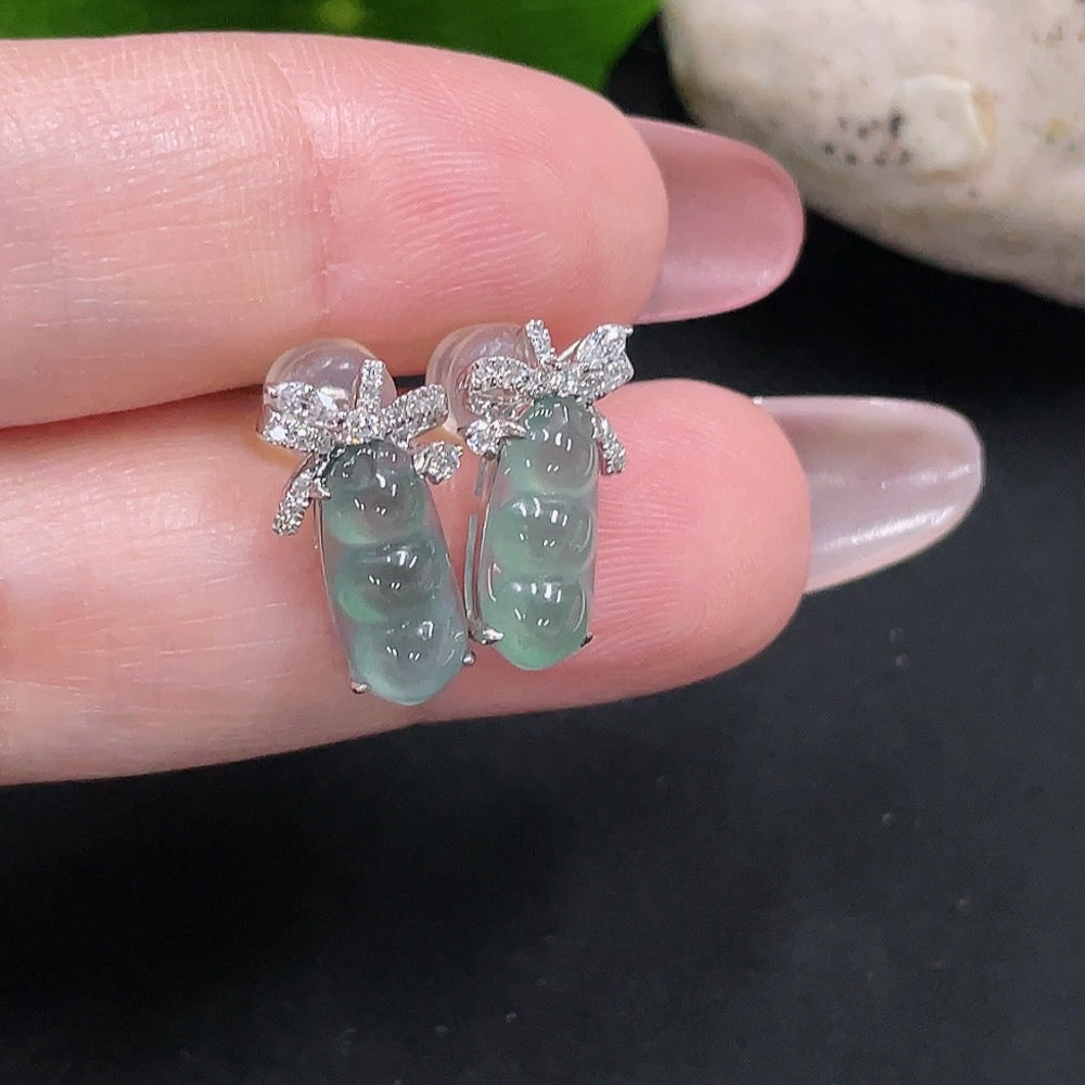 Huiliu Certified jadeite earrings pair with two large non-diamond stones, including ear studs, showcasing smooth green jade jewelry.