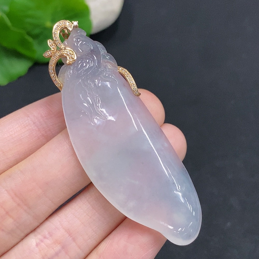 Jadeite Fu Gua pendant with 18K gold clasp and diamonds, featuring smooth green jade and intricate craftsmanship.