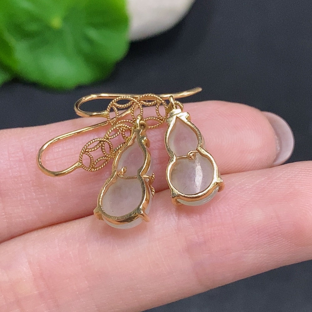 Huiliu certified jadeite gourd inlaid earrings featuring intricate design and smooth green jade surface, traditional jewelry style.