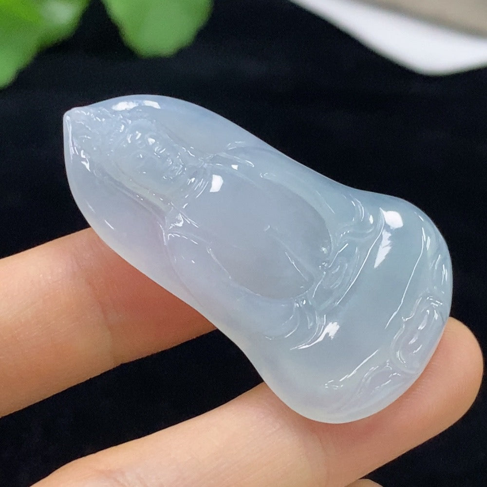 Jadeite Guanyin pendant in green jade, crafted by HUILIU HQ, weighing approximately 11.09g, detailed carved figure on the pendant.