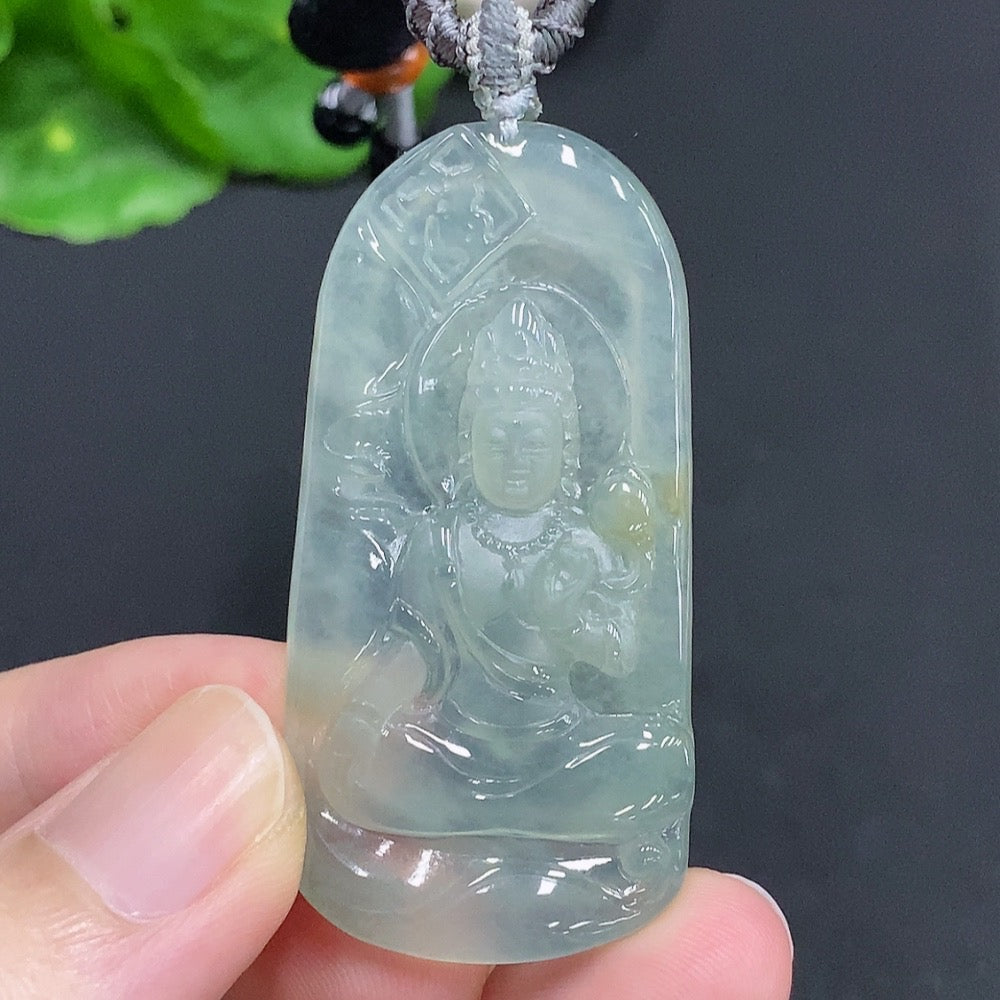Jadeite Guanyin pendant with a rope, weighing approximately 15.8g, crafted by HUILIU HQ, featuring detailed carved design.