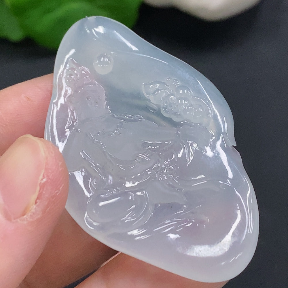 Jadeite Guanyin pendant from HUILIU HQ, featuring detailed carved figure, weighs approximately 15.9g, made of smooth green jade.
