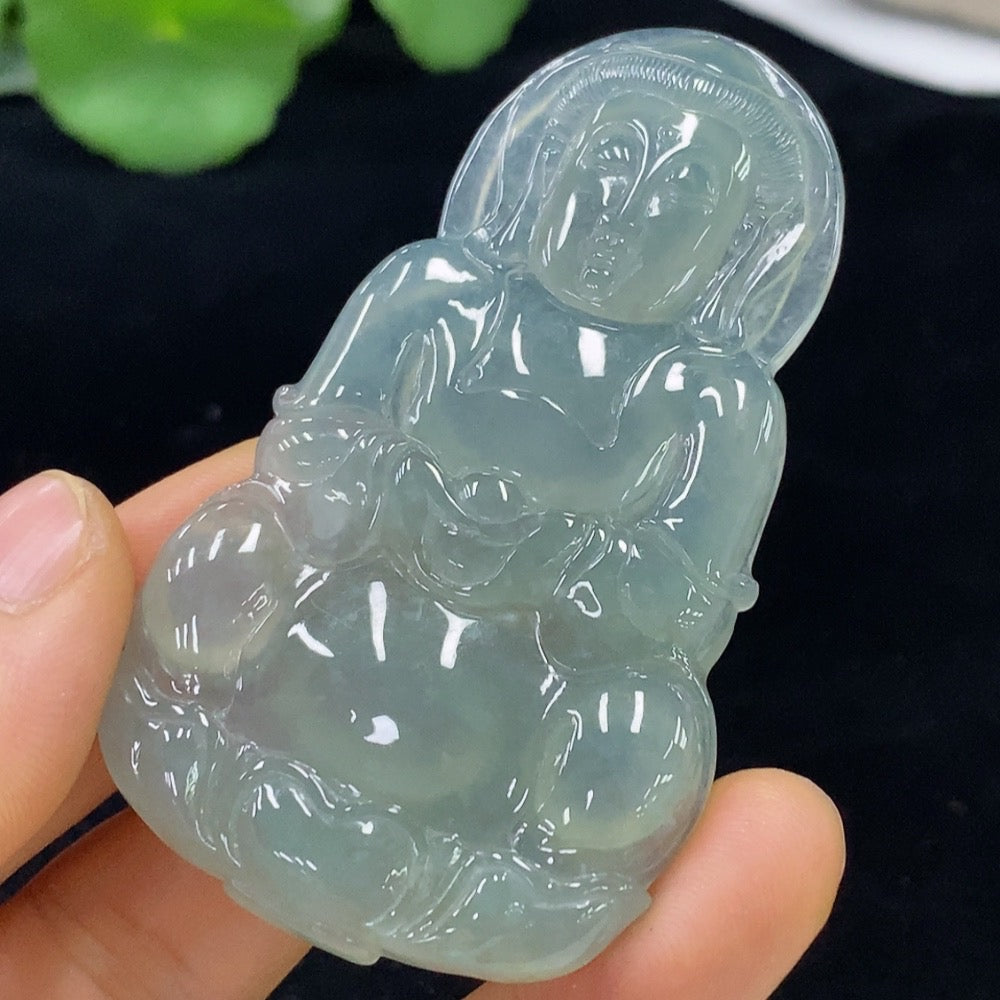 Jadeite Guanyin pendant from HUILIU HQ, carved jade with detailed figure, weighs approximately 30.36g.