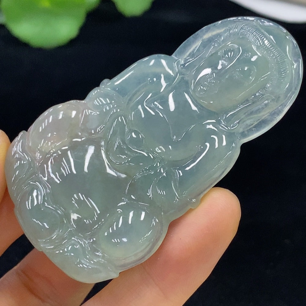 Jadeite Guanyin pendant from HUILIU HQ, detailed carved figure, approximately 30.36g, featuring intricate jade craftsmanship.