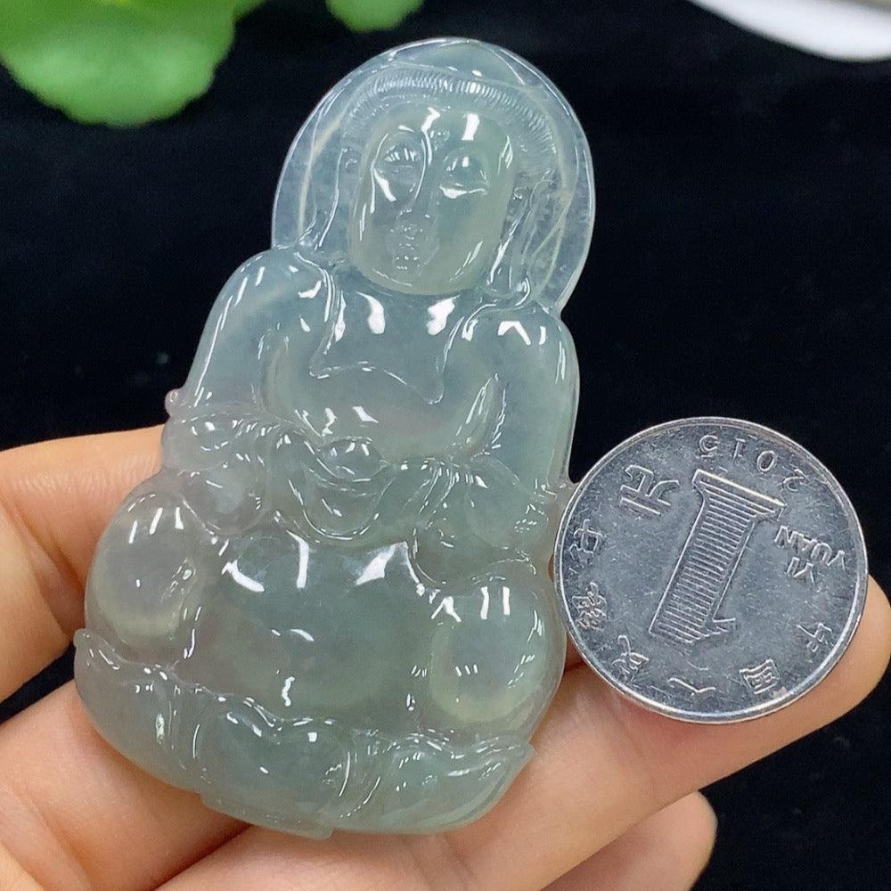 Jadeite Guanyin pendant from HUILIU HQ, detailed carved figure, weighing approximately 30.36g, featuring smooth jade surface and craftsmanship.