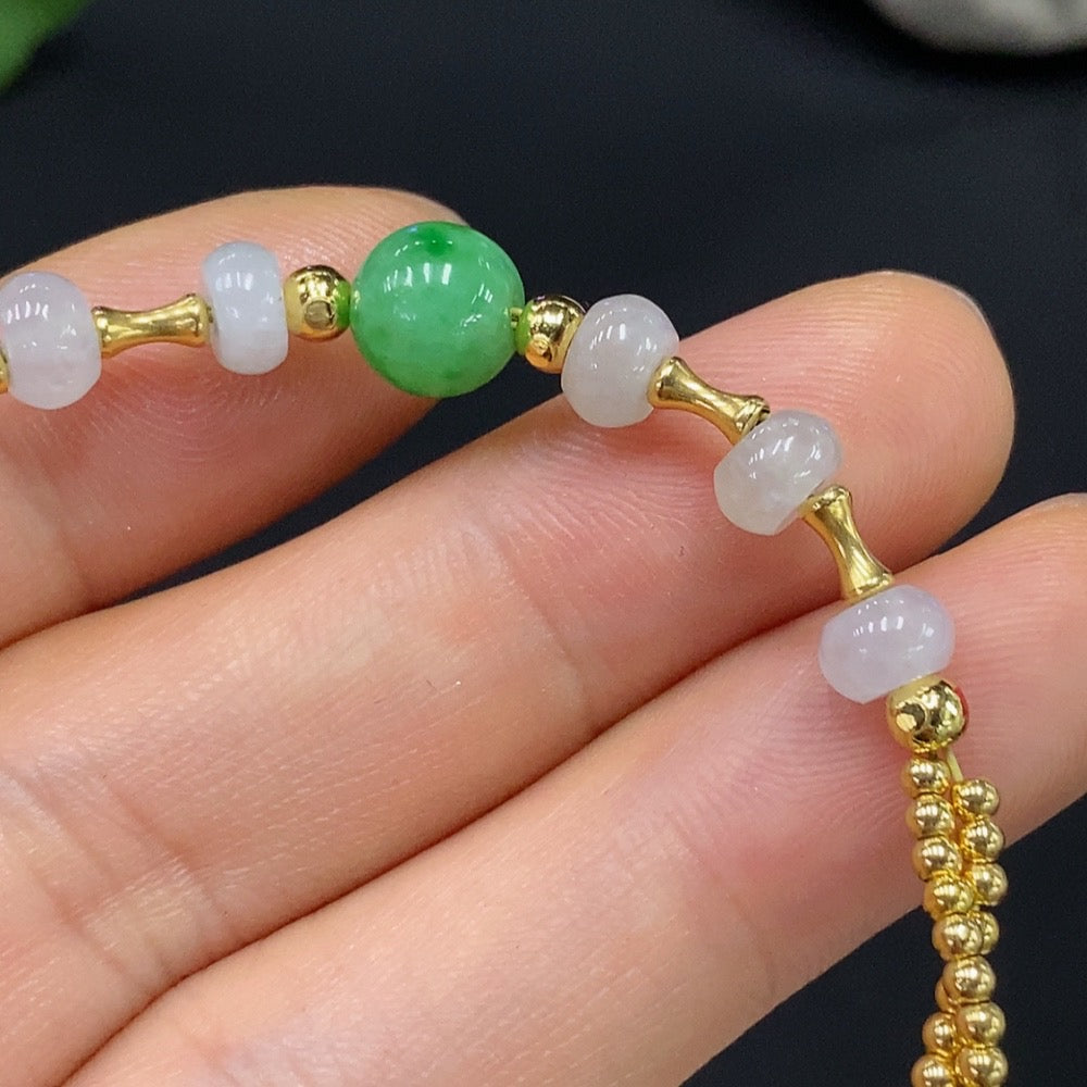 HUILIU HQ jadeite inlaid bracelet with 7.5/5.6mm jade, non-gold marked, red accents, and an undetectable 18k string design.