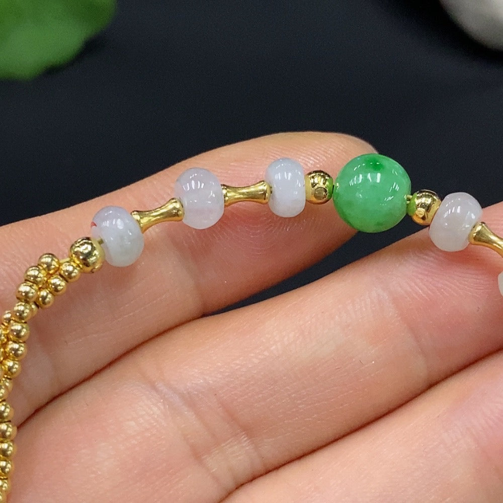 HUILIU HQ jadeite inlaid bracelet with 7.5/5.6mm jade stones, red markings, and an undetectable 18k string.