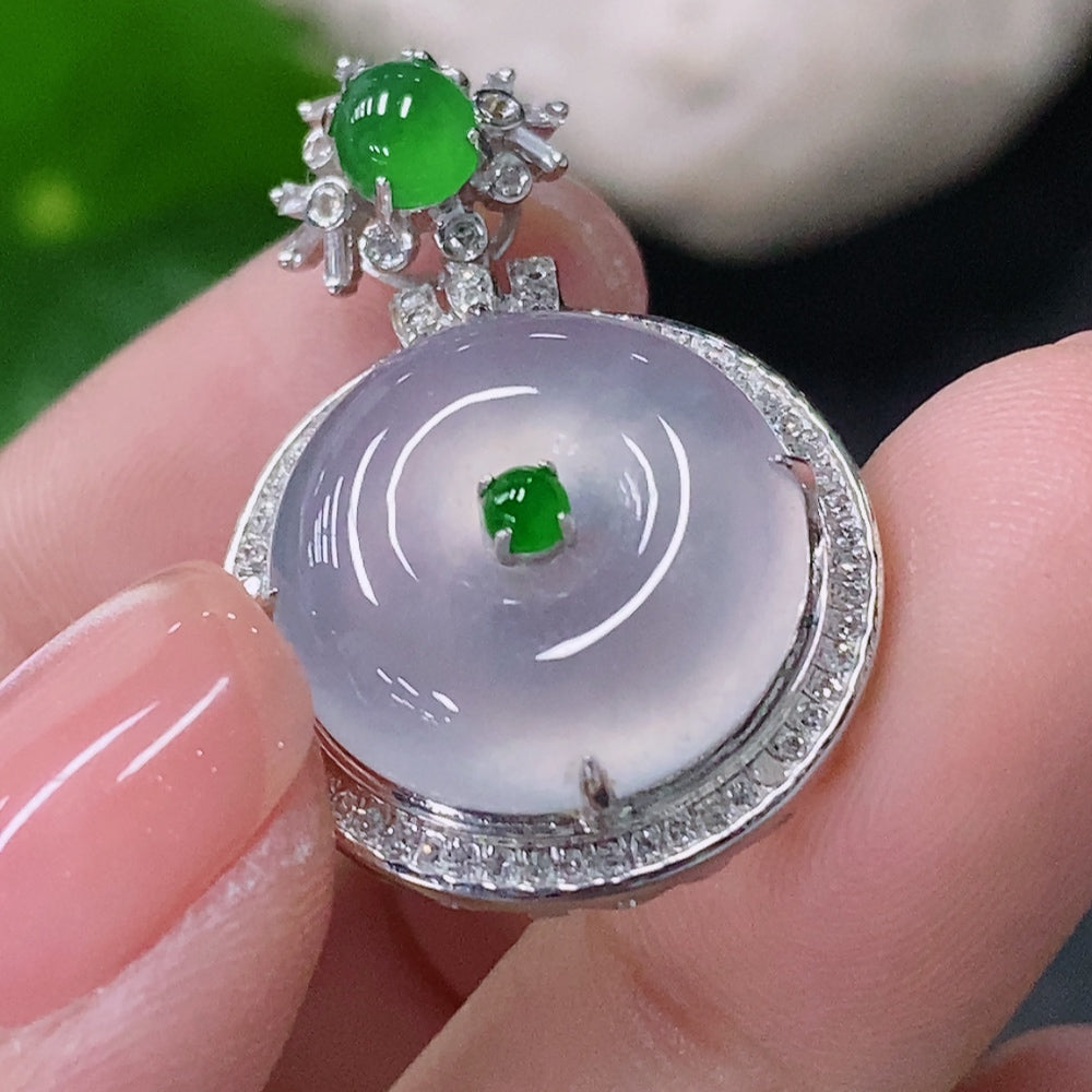 Jadeite inlaid peace pendant with 18K gold and diamond accents, featuring intricate design and a smooth jade surface.