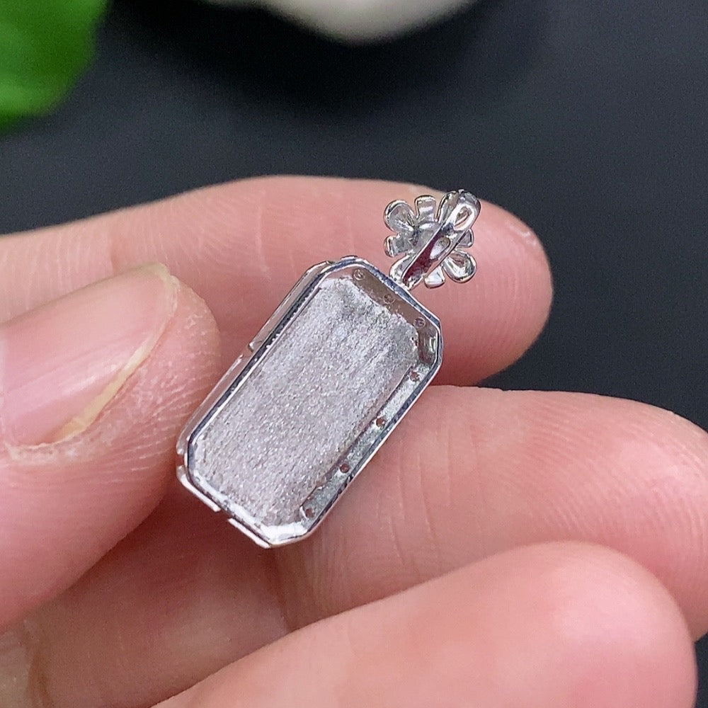 Jadeite inlaid pendant crafted with 18k gold from HUILIU HQ, featuring a polished jade stone, weighing approximately 2 grams.