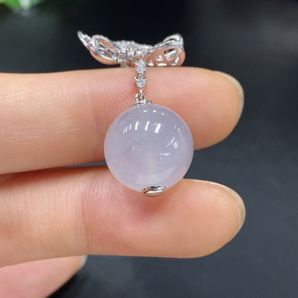 Jadeite inlaid pendant with 18k gold, crafted by HUILIU HQ, weighing approximately 6.05 grams, showcasing intricate jade craftsmanship.